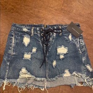 Distressed denim skirt